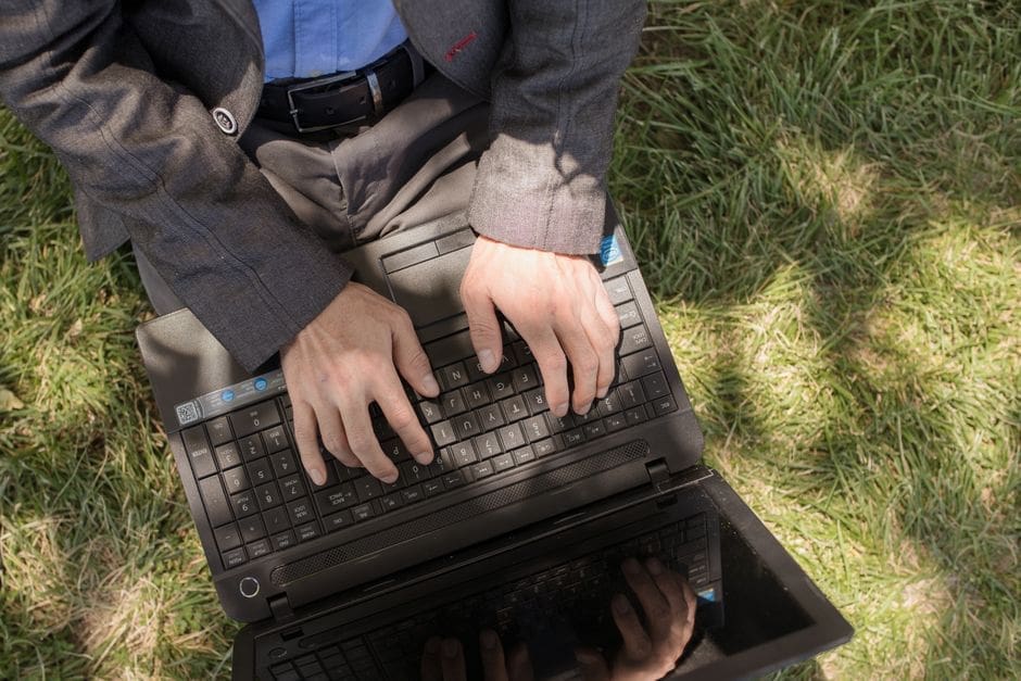 Man in work clothes rebuilding his life outdoors in the Treasure Valley